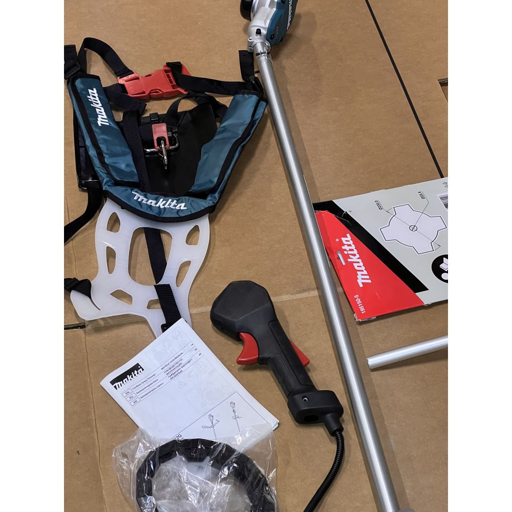 Аккумуляторный триммер Makita UR002GZ05, 40 В, 6500 об/мин, без АКБ и ЗУ (УЦЕНЕННЫЙ ТОВАР) (UR002GZ05/U)