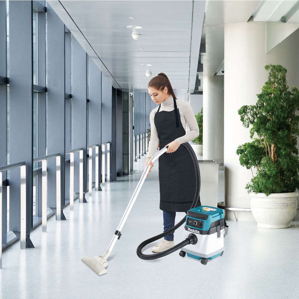 Аккумуляторный строительный пылесос Makita DVC150L, 2x18 В, с опцией работы от сети, 15 л, с 2 АКБ 5 Ач, без ЗУ (DUST-KITM13)