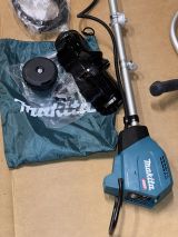 Аккумуляторный триммер Makita UR002GZ05, 40 В, 6500 об/мин, без АКБ и ЗУ (УЦЕНЕННЫЙ ТОВАР) (UR002GZ05/U)