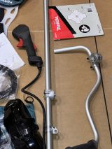 Аккумуляторный триммер Makita UR002GZ05, 40 В, 6500 об/мин, без АКБ и ЗУ (УЦЕНЕННЫЙ ТОВАР) (UR002GZ05/U)